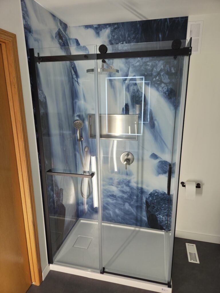 Modern shower with waterfall design in St. Andrews, MB.