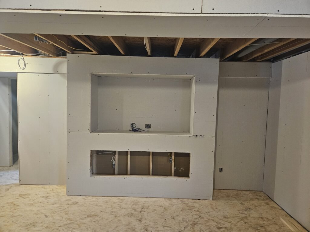 unfinished room with drywall installation