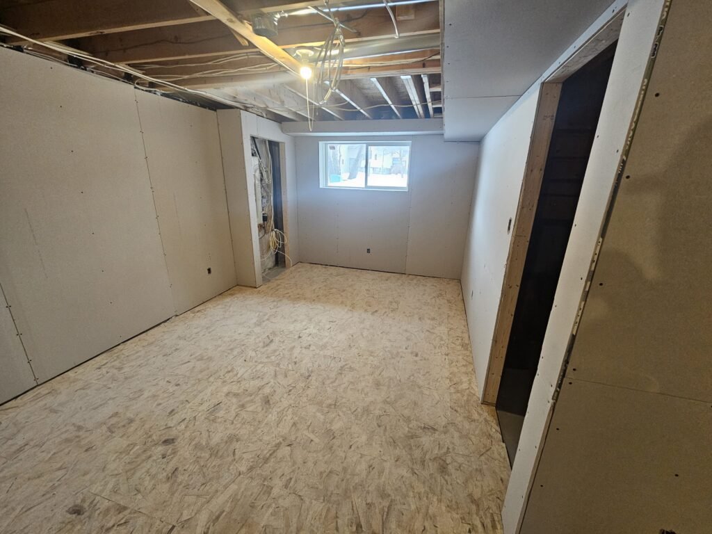 Empty room with drywall and window