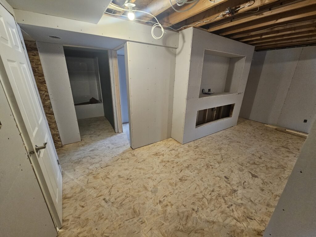 unfinished interior with drywall and sub-flooring